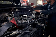 Photo of Craftsman socket set CMMT45752V on car engine during repair, mechanic working nearby.